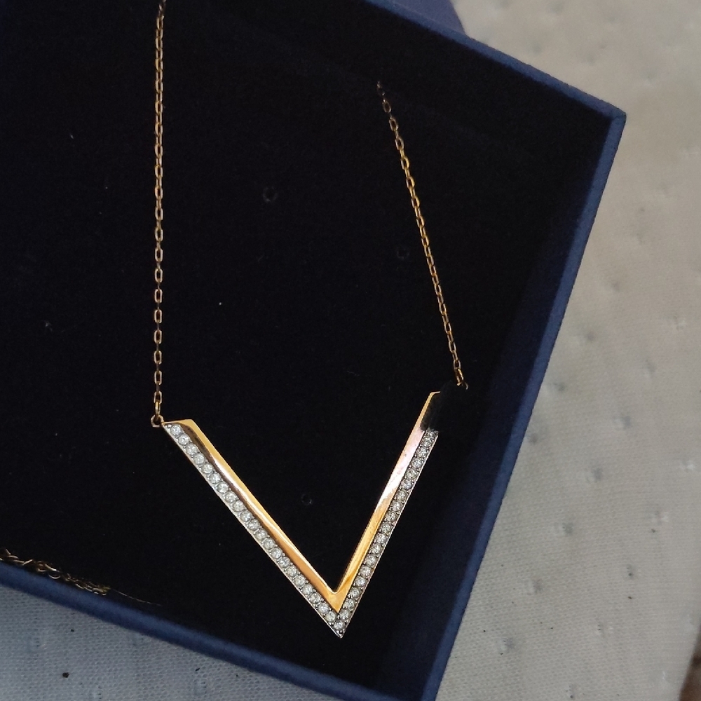 Swarovski Women's Rose Gold-Tone Plated Crystal Pave Delta Pendant Necklace